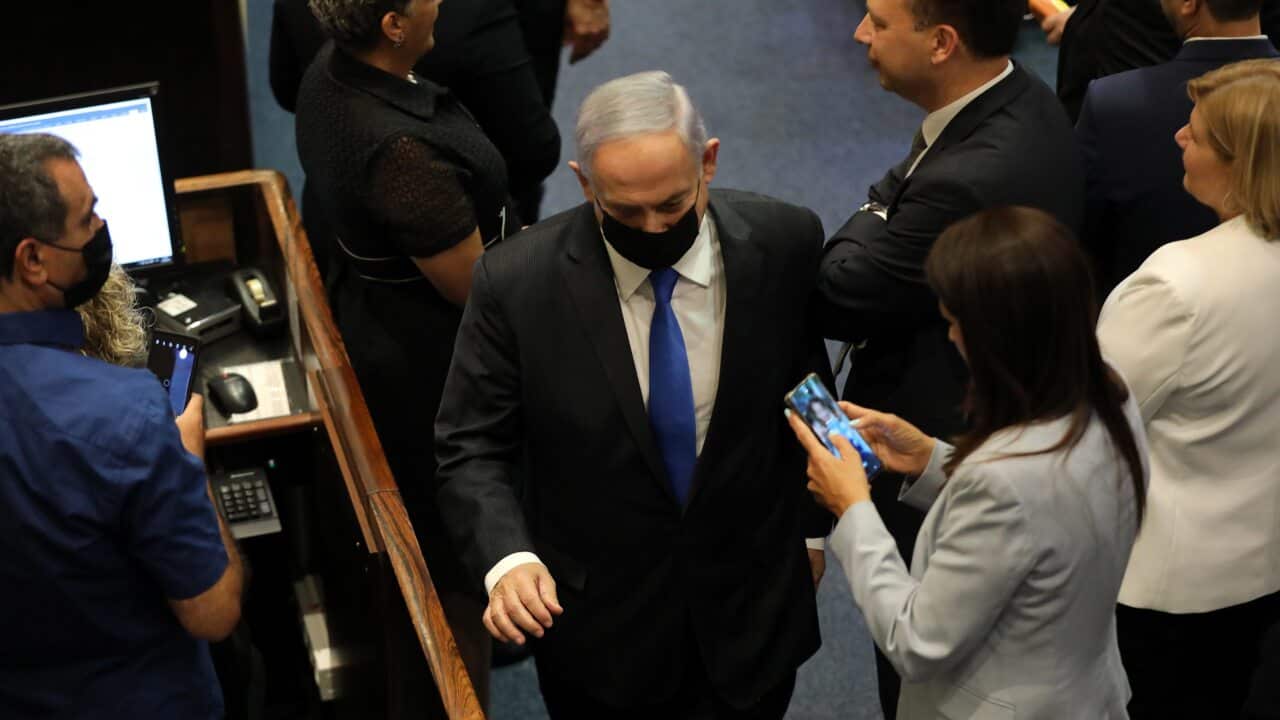 Benjamin Netanyahu leaves the Knesset after the results of a special voting session on the formation of a new coalition government on 13 June, 2021.