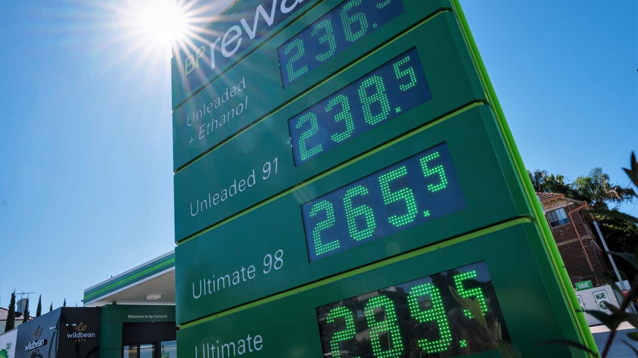 A close up of a petrol station price board with unleaded 98 at 265.5c