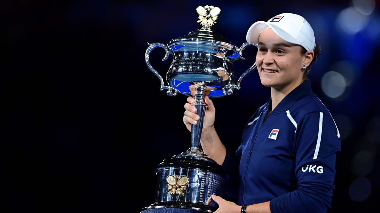 Ashleigh Barty of Australia holds the Daphne Akhurst Memorial Cup after winning the Womens singles final against Danielle Collins of the USA
