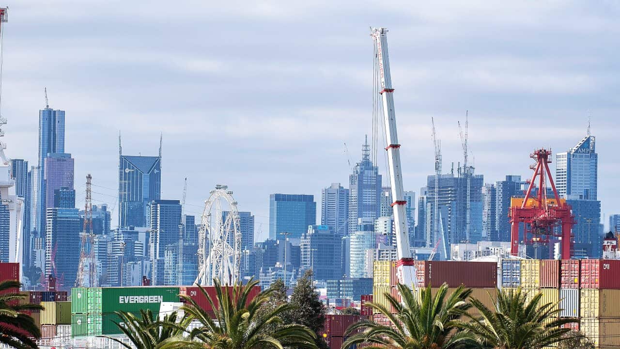 The Melbourne city skyline and shipping docks are seen from Yarraville, Melbourne, Sunday June 2, 2019. The Australian Bureau of Statistics will release the quarterly balance of payments on Tuesday, June 4, 2019. (AAP Image/Ellen Smith) NO ARCHIVING