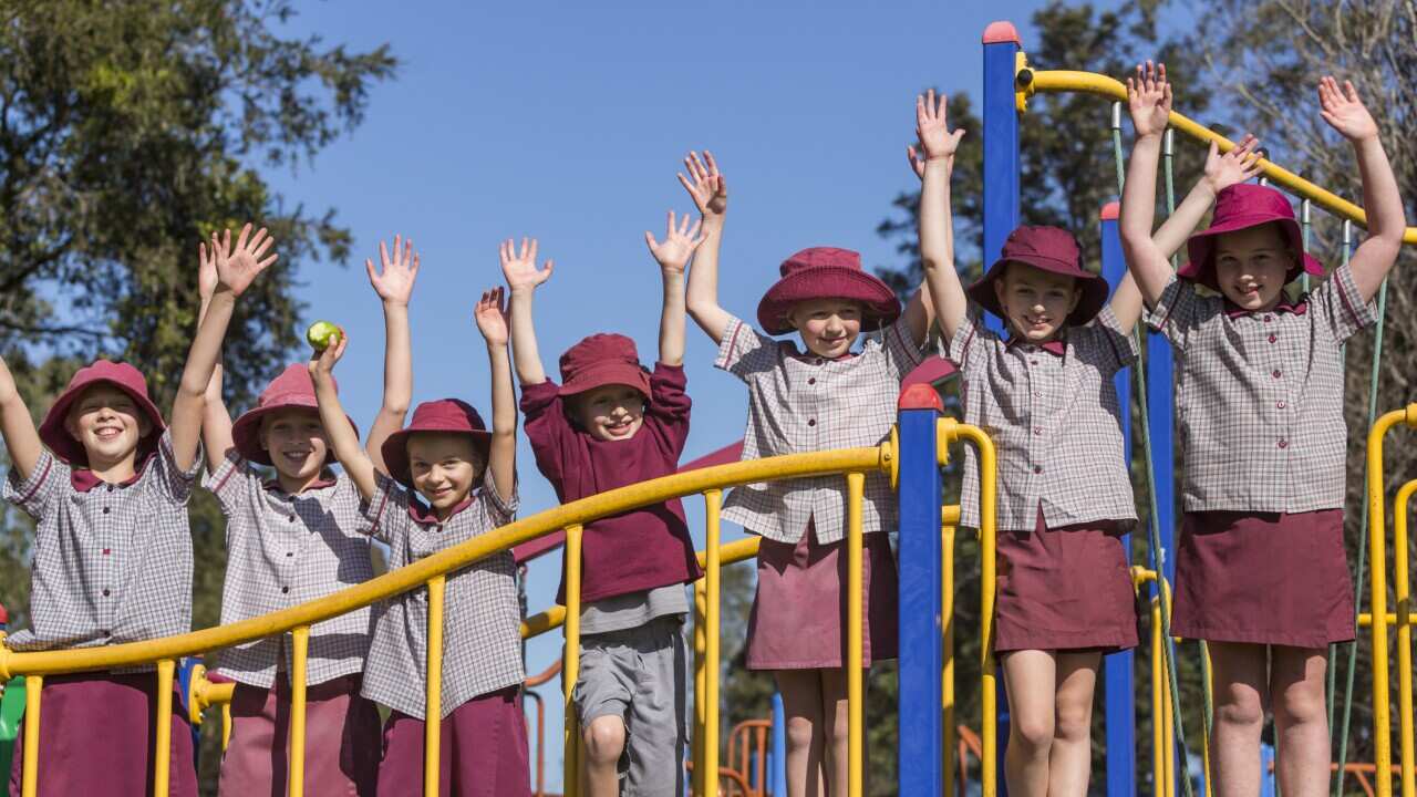 School Children Outdoors on Play Equipment