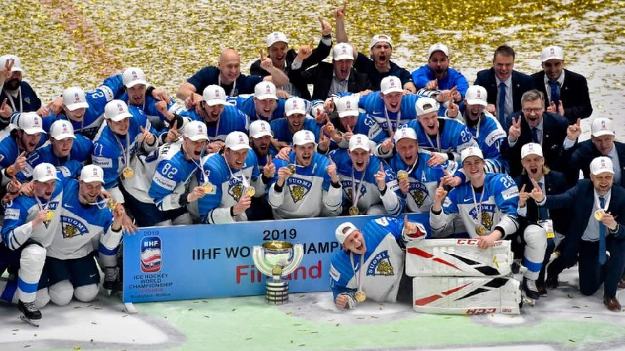 Hockey players of Finland celebrate a victory after Finland beat Canada 3-1 in the Ice Hockey World Championships gold medal match at the Ondrej Nepela Arena in Bratislava, Slovakia.