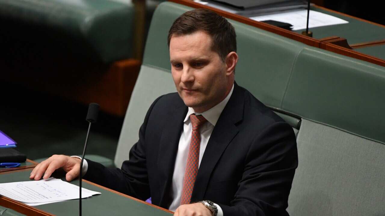 Minister for Immigration Alex Hawke during Question Time in the House of Representatives at Parliament House in Canberra, Monday, February 14, 2022. (AAP Image/Mick Tsikas) NO ARCHIVING