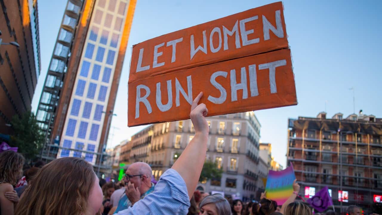 A protester holds a placard during a protest called by feminist associations in support of Spanish midfielder Jenni Hermoso. (AAP)