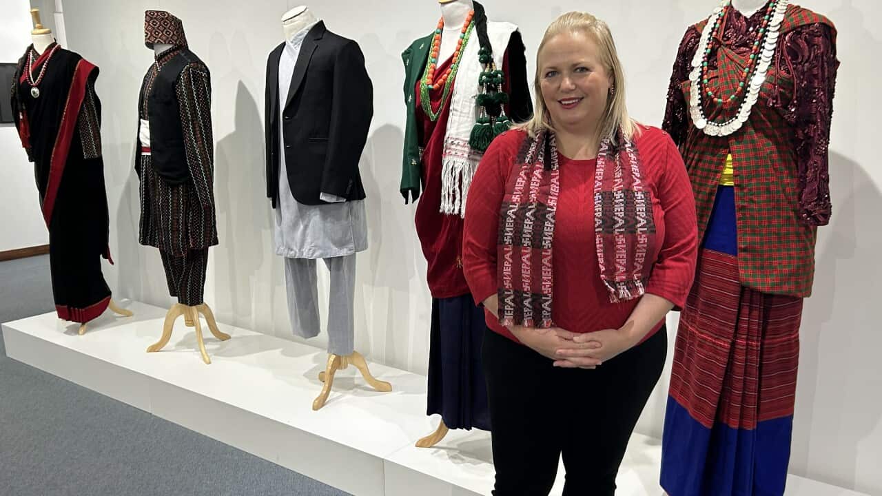 Mayor Elise Borg with Nepalese dressware on display.jpg