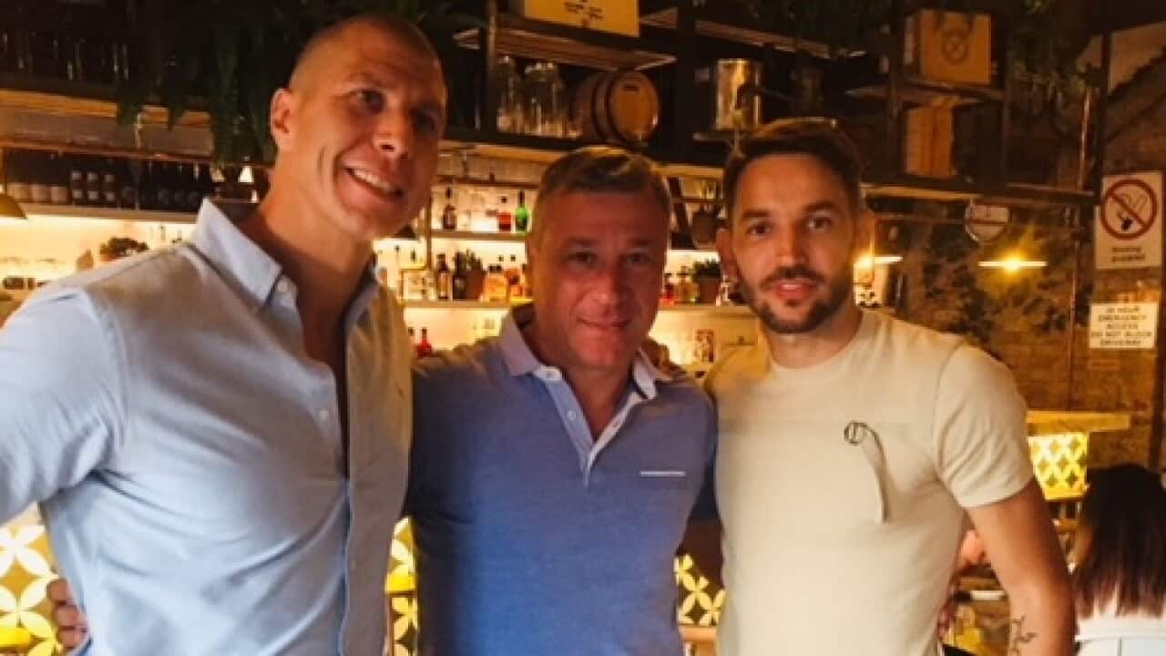 Milos Ninkovic (right) with Misa Radovic (center) and Petar Tasic, owner of the Serbian restaurant in Western Sydney