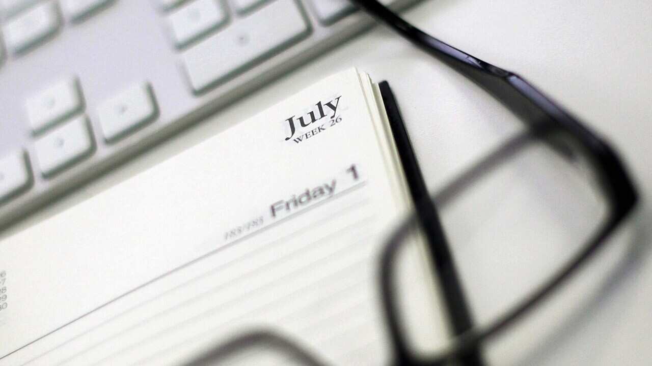 A 2015-2016 financial year diary is featured with reading glasses in a stock image in Sydney, Wednesday, Jan. 13, 2016. (AAP Image/Sam Mooy) NO ARCHIVING