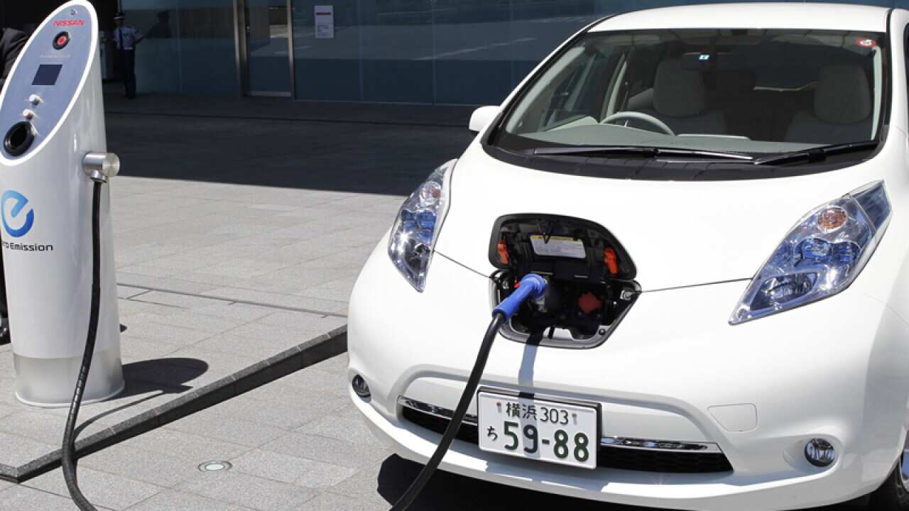 A quick charge of a Nissan Leaf by a solar-assisted EV charging system