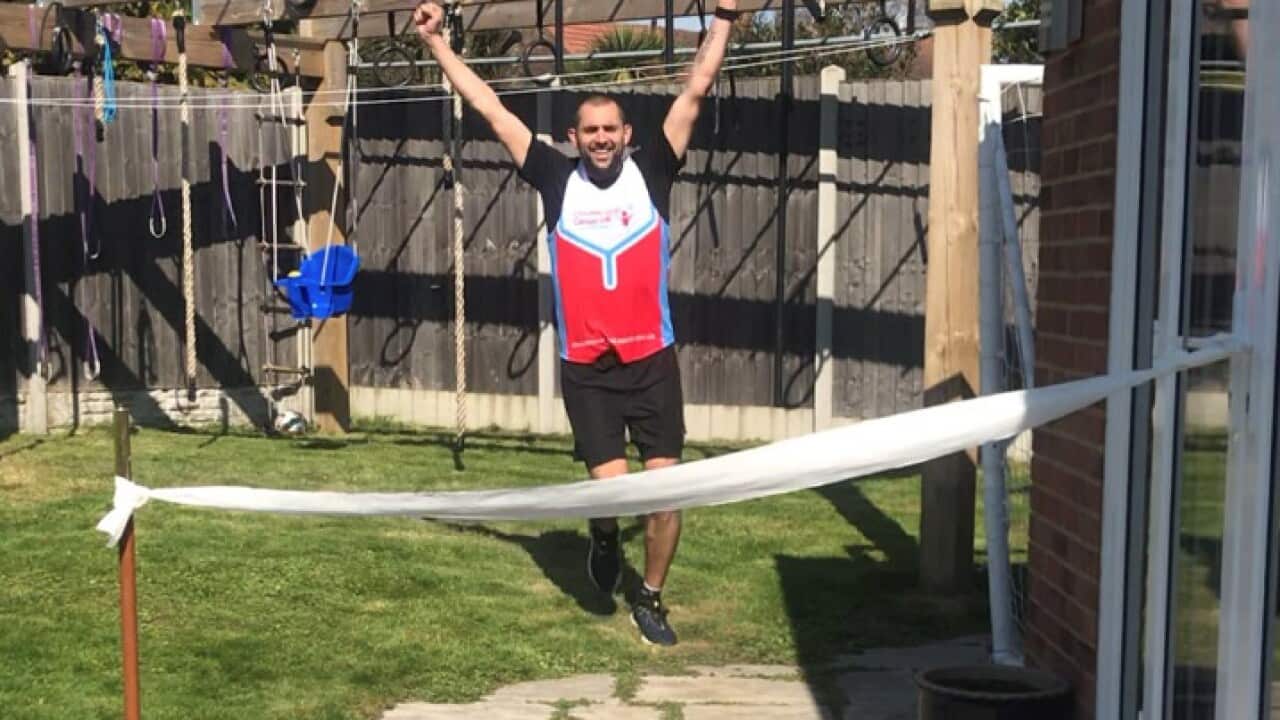 James Page crossing a toilet roll finishing line