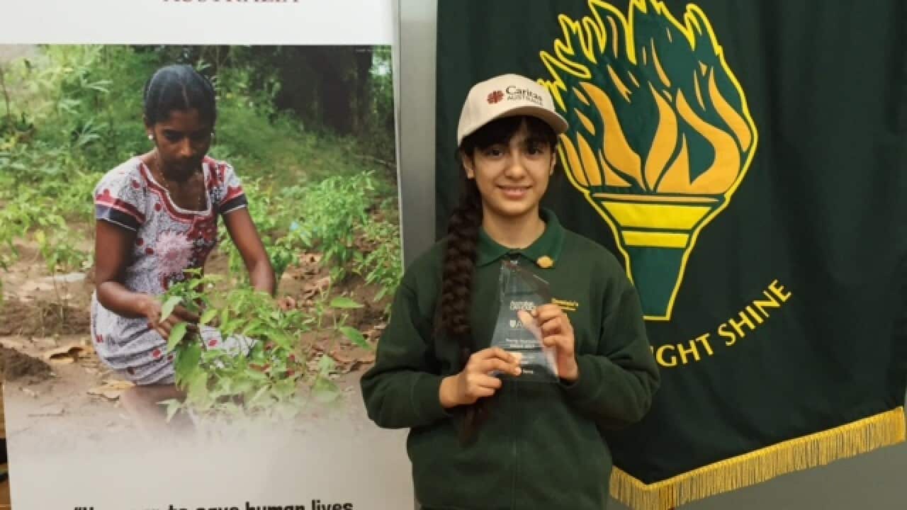 Sarah Sona with her award at the Australian Catholics magazine awards ceremony. 