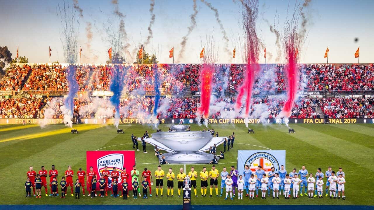 Adelaide United and Melbourne City players line up before the 2019 FFA Cup final
