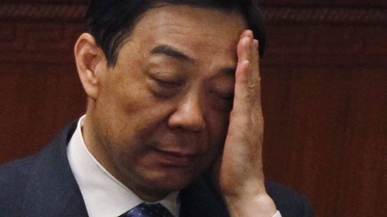 Former Chinese politician Bo Xilai in Beijing gestures.
