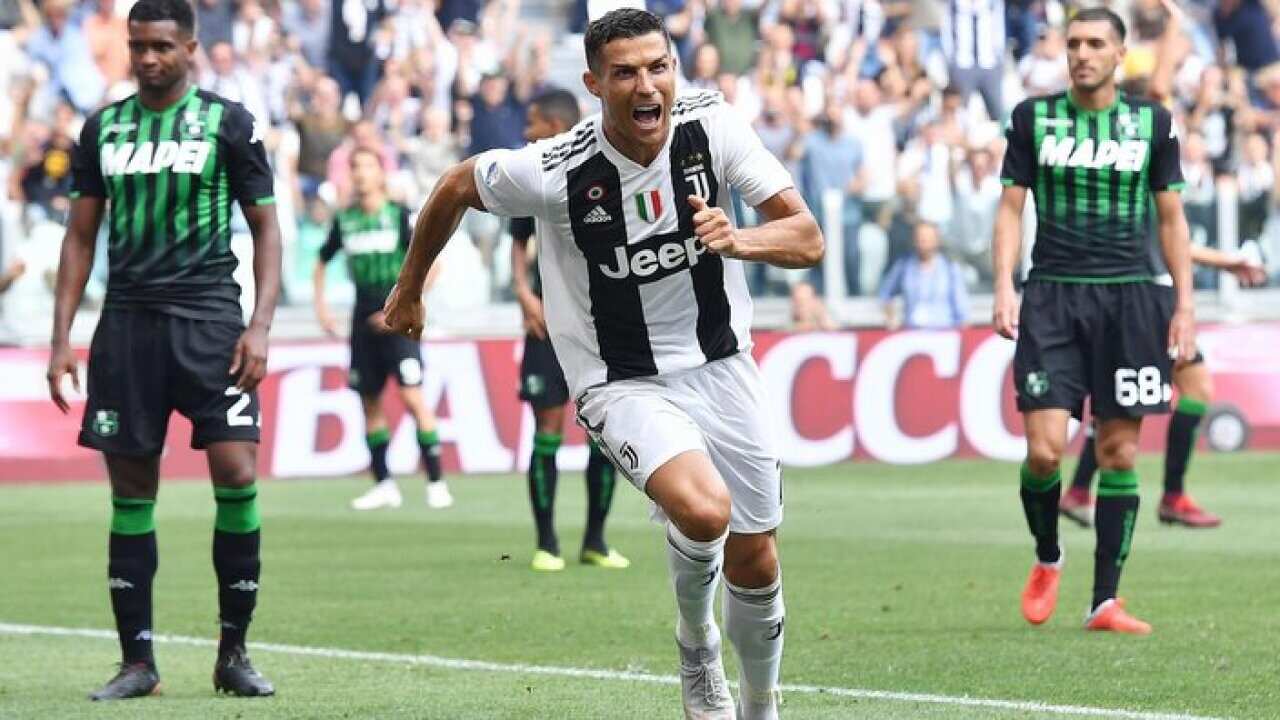Juventus' Cristiano Ronaldo celebrates after scoring during a Serie A soccer match between Juventus and Sassuolo, at the Allianz Stadium in Turin, Italy, Sunday, Sept. 16, 2018.