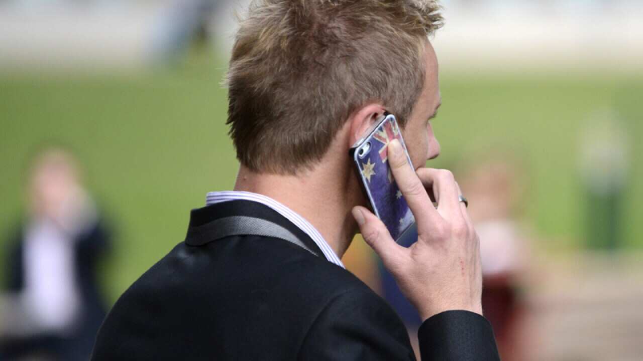 A man uses a smartphone