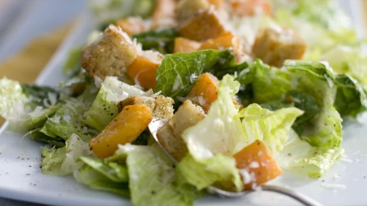 A plate of butternut Caesar salad.