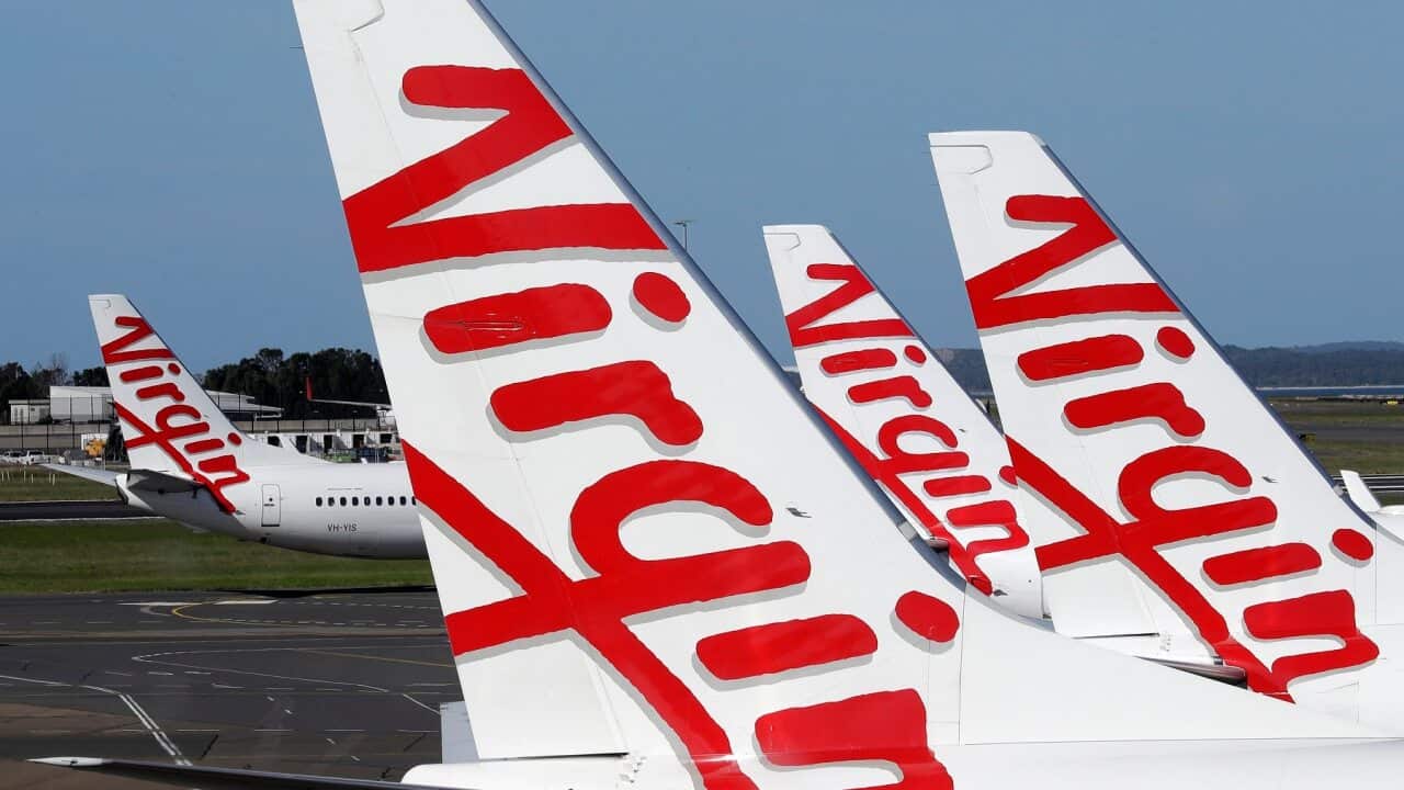Virgin Australia planes lined up at Sydney Airport
