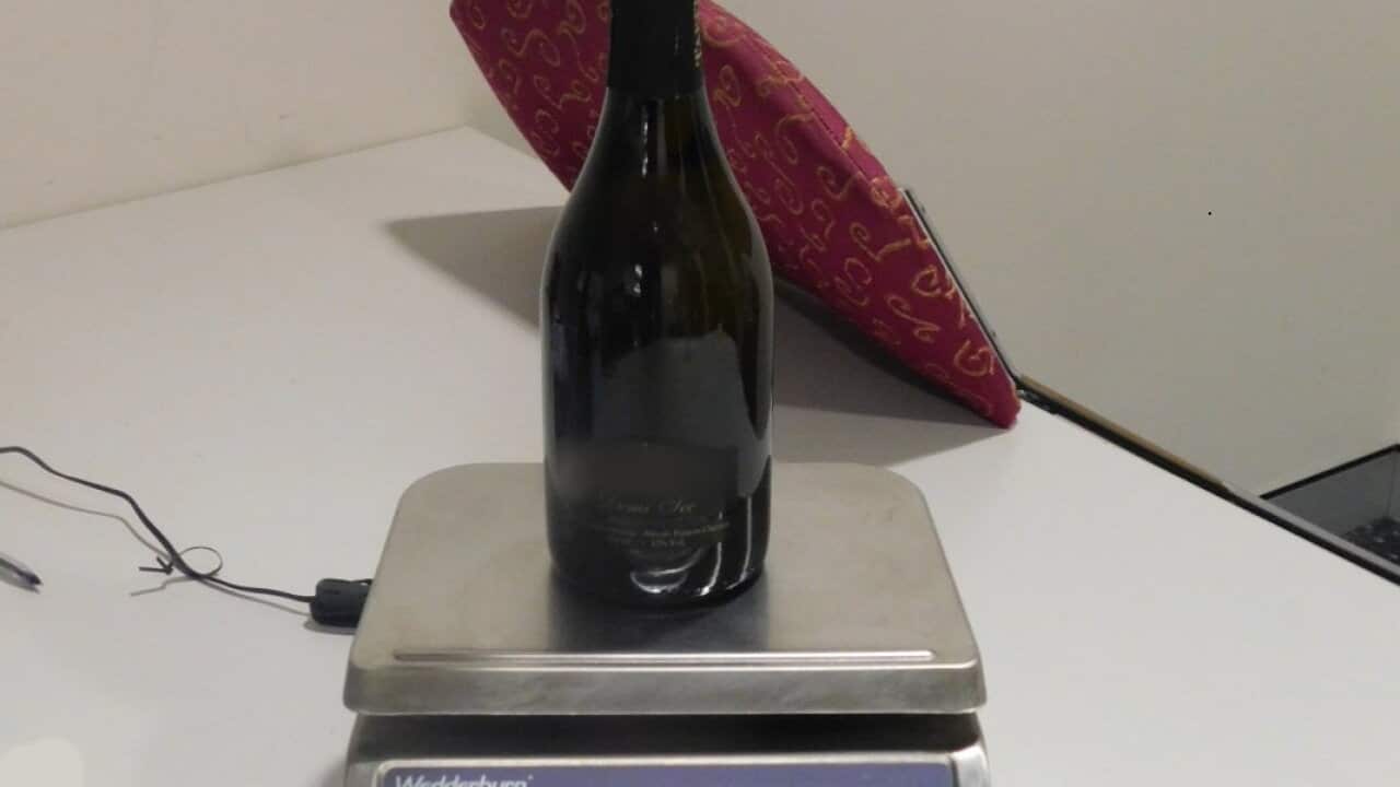 Cocaina en una botella de vino