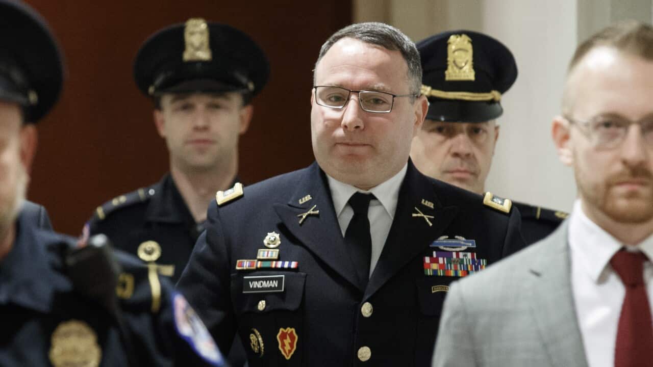 US Army Lieutenant Colonel Alexander Vindman (C), is the the top Ukraine expert on the National Security Council.