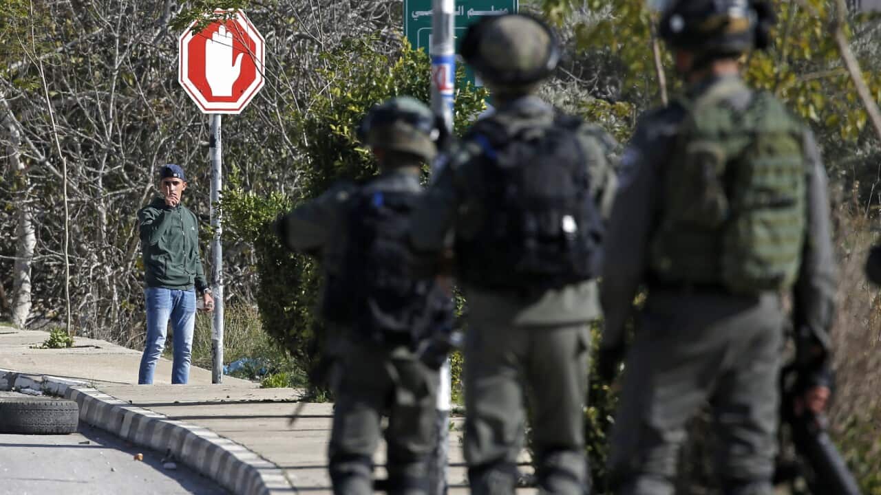 Israeli soldiers deploy during clashes in the West Bank city of Ramallah following a raid on December 10, 2018, one day after a drive-by shooting attack next to a settlement which many Israelis were injured.