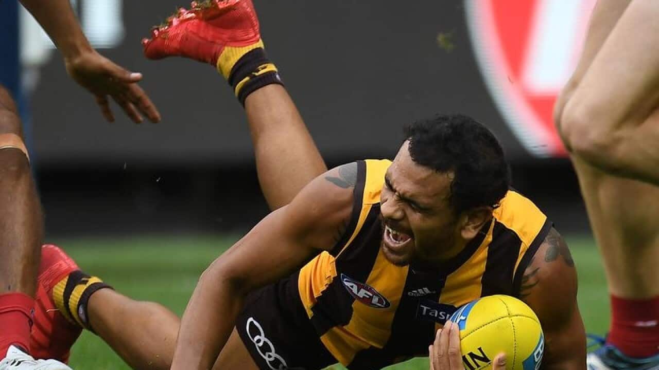Hawks' Cyril Rioli of the Hawks was crocked against Melbourne Demons.