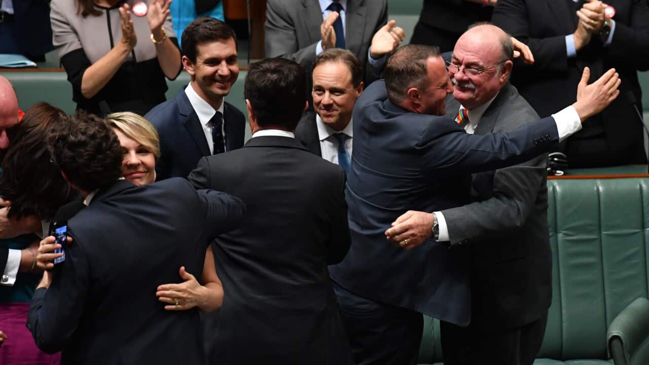 Celebration in parliament after same-sex marriage bill passes