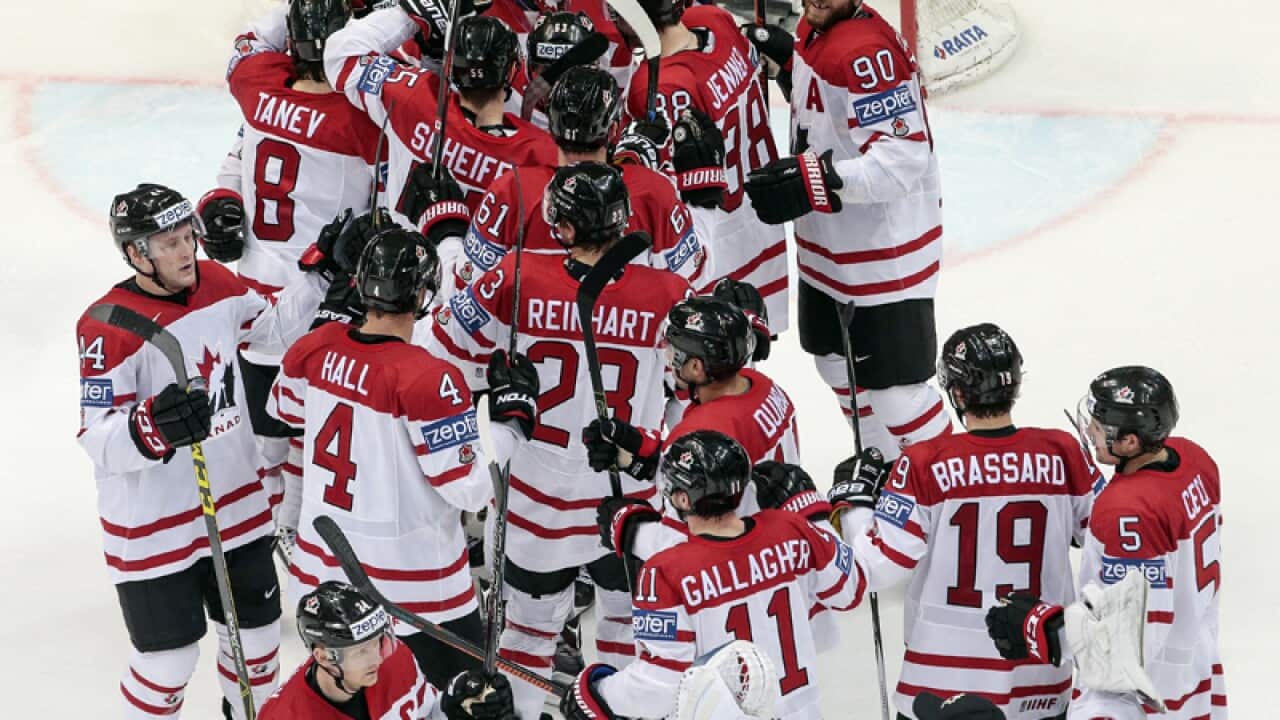 Members of the Canadian ice hockey team