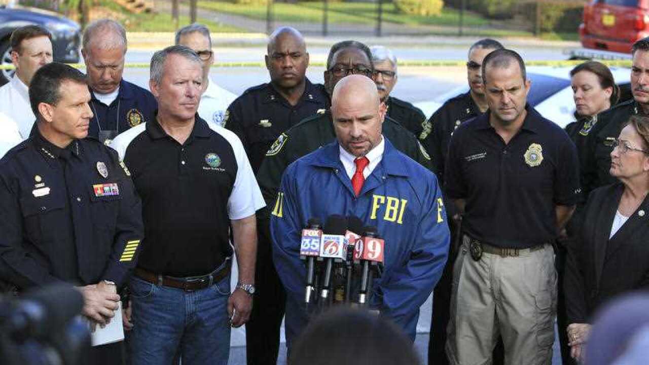 FBI assistant special agent in charge Ron Hopper (center) speaks during a press conference regarding the Orlando Pulse nightclub shooting.