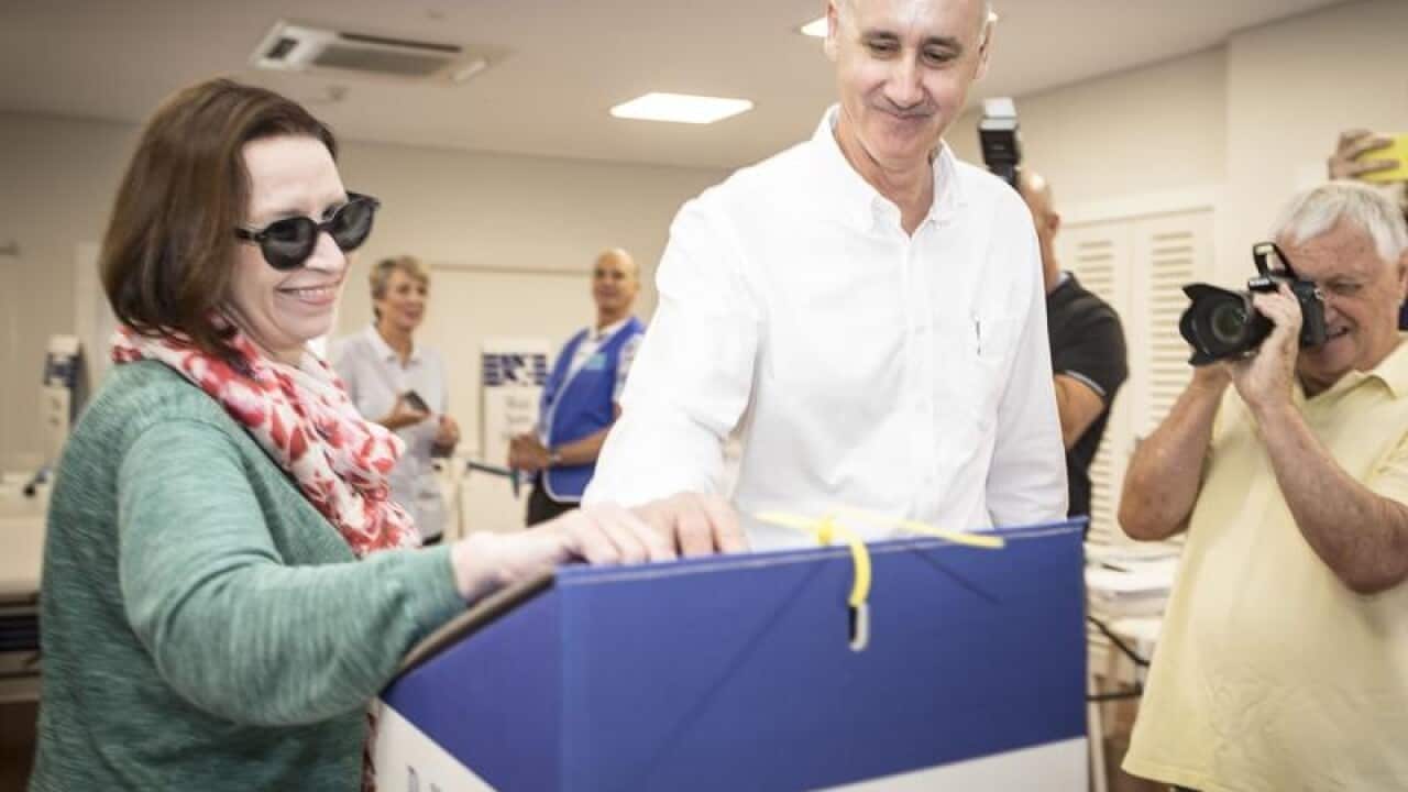David Honey and wife Robyn vote in Cottesloe.