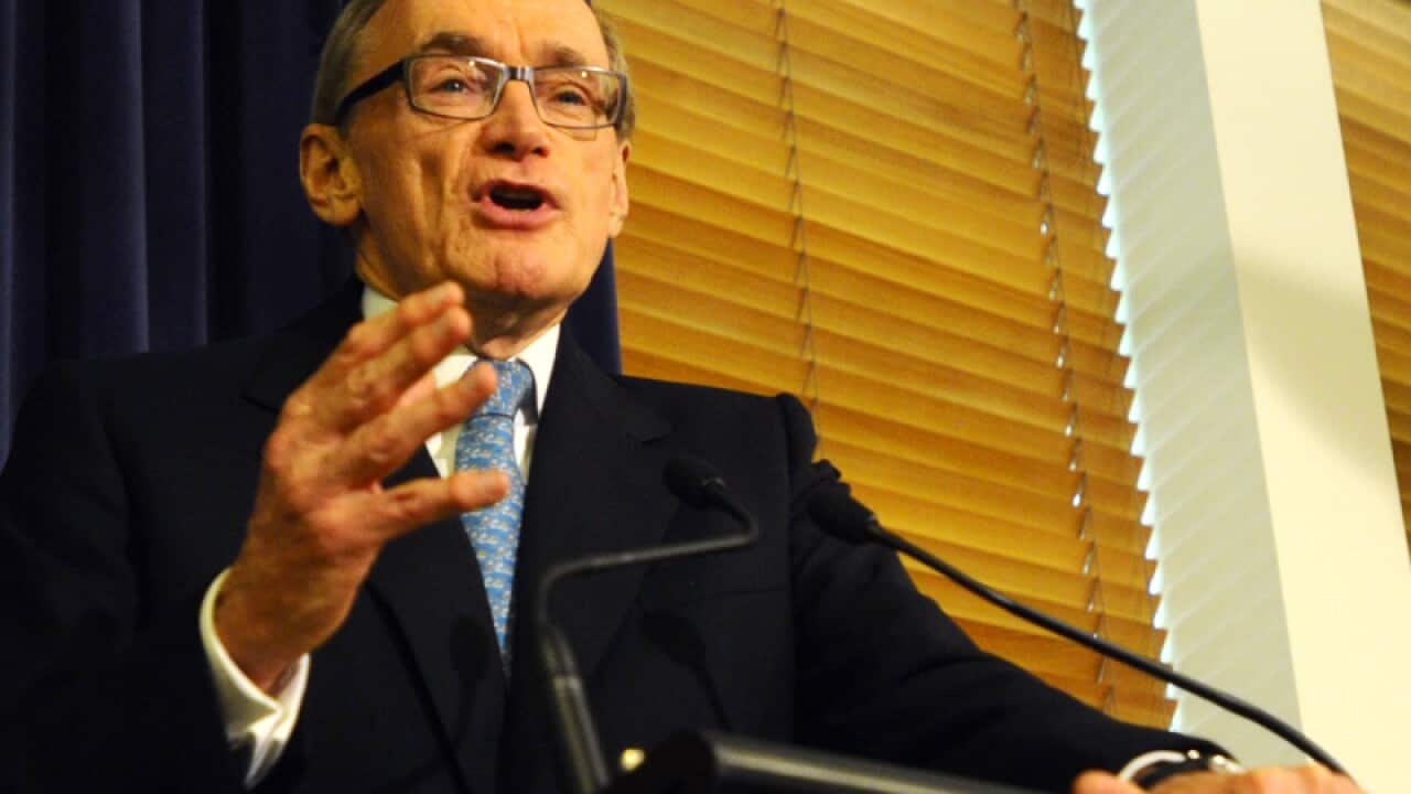 Senator Bob Carr speaks during a press conference at Parliament House