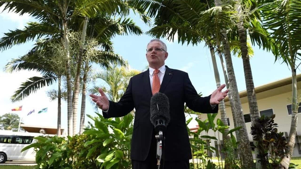 Scott Morrison has made a flying visit to Port Vila on his way to Suva.