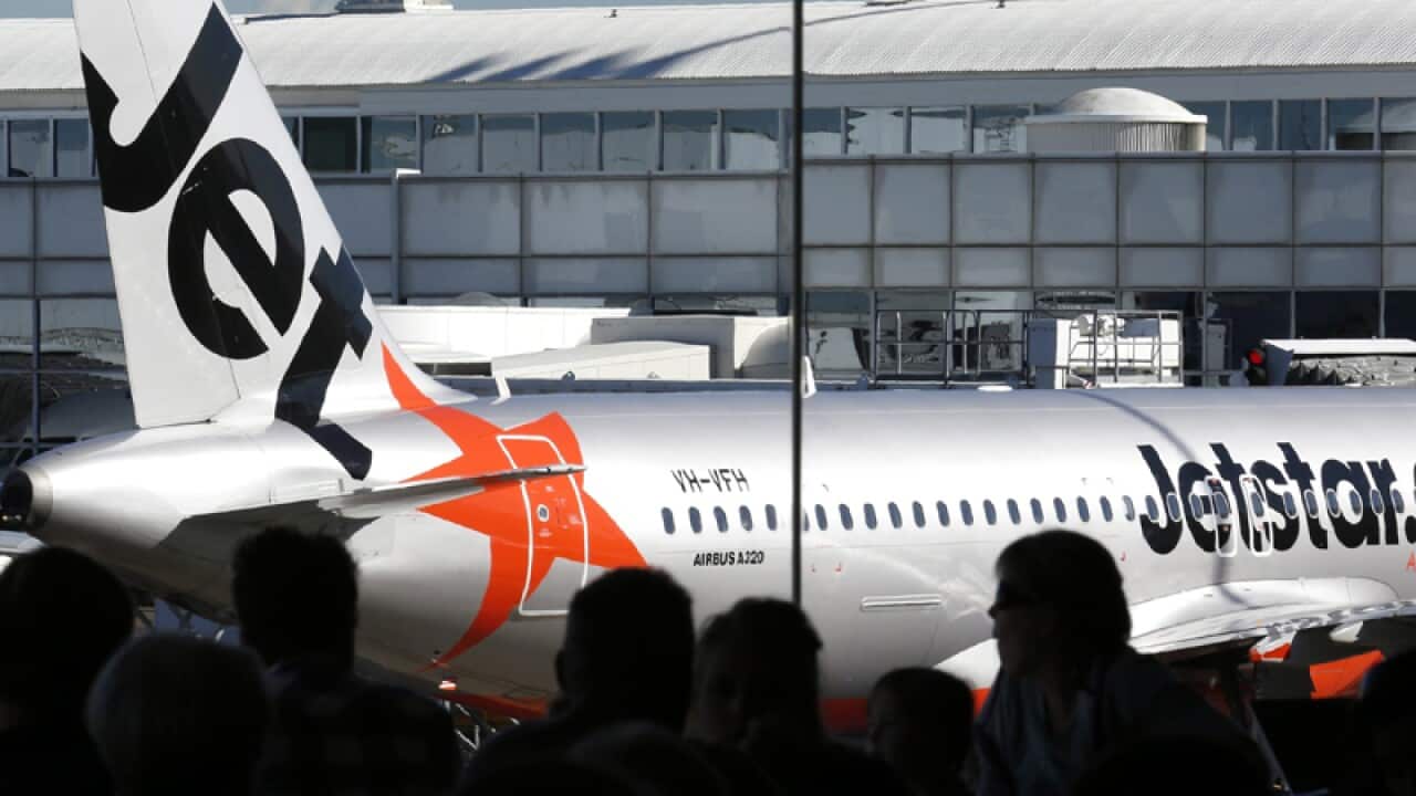 Travellers waiting for flights
