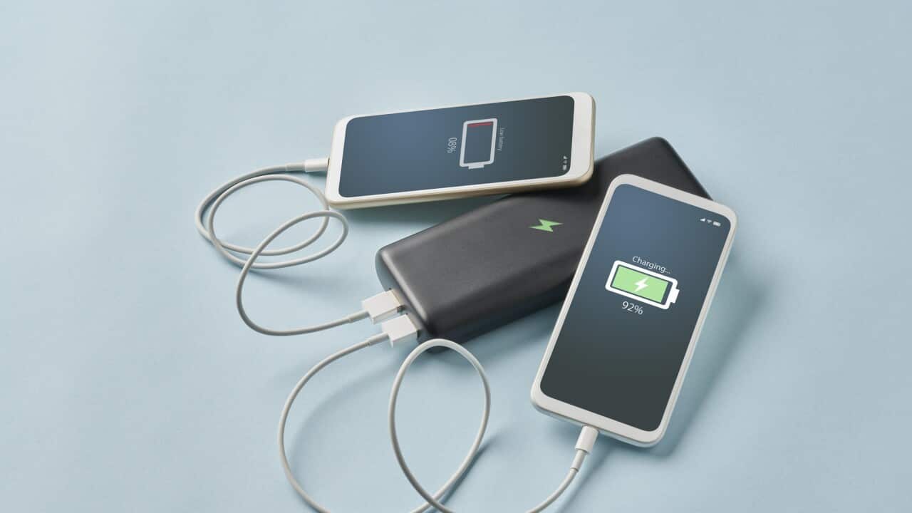 Smart Phone Connected To Portable Charger