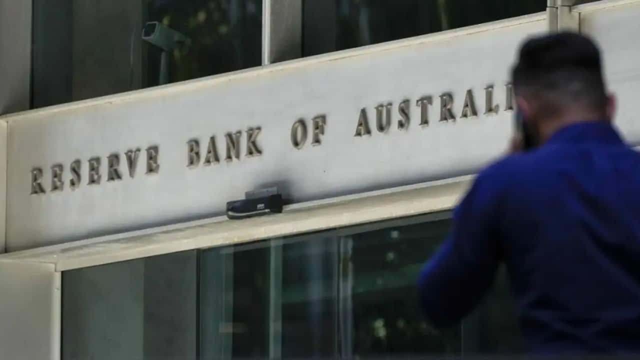 A pedestrian walks past the Reserve Bank of Australia building in Sydney, Australia, Thursday, Oct. 7, 2021.