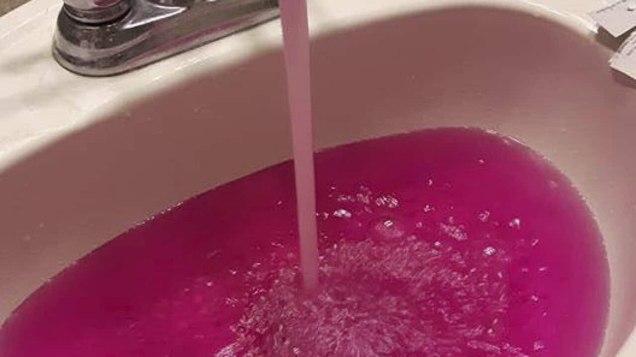 Residents in a small town northwest of Edmonton say bright pink water coming out of their taps was a bit of a shock.