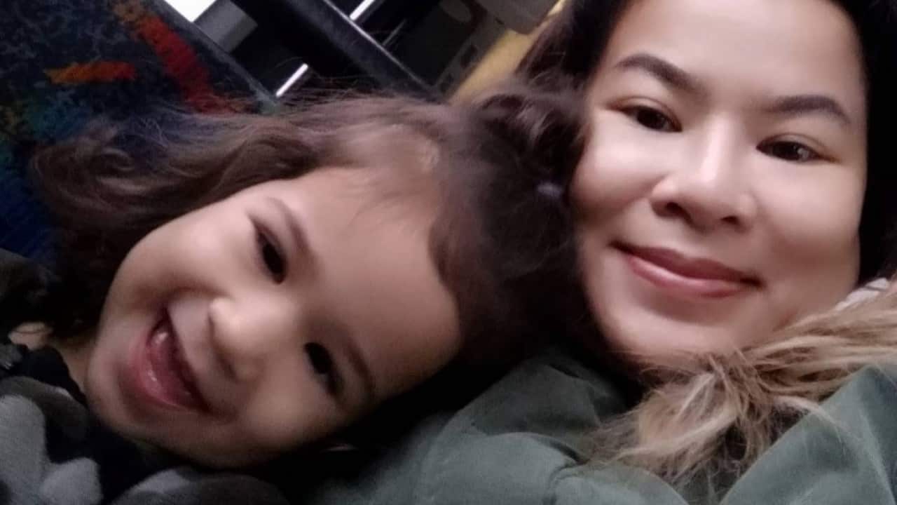 A mother with her daughter.