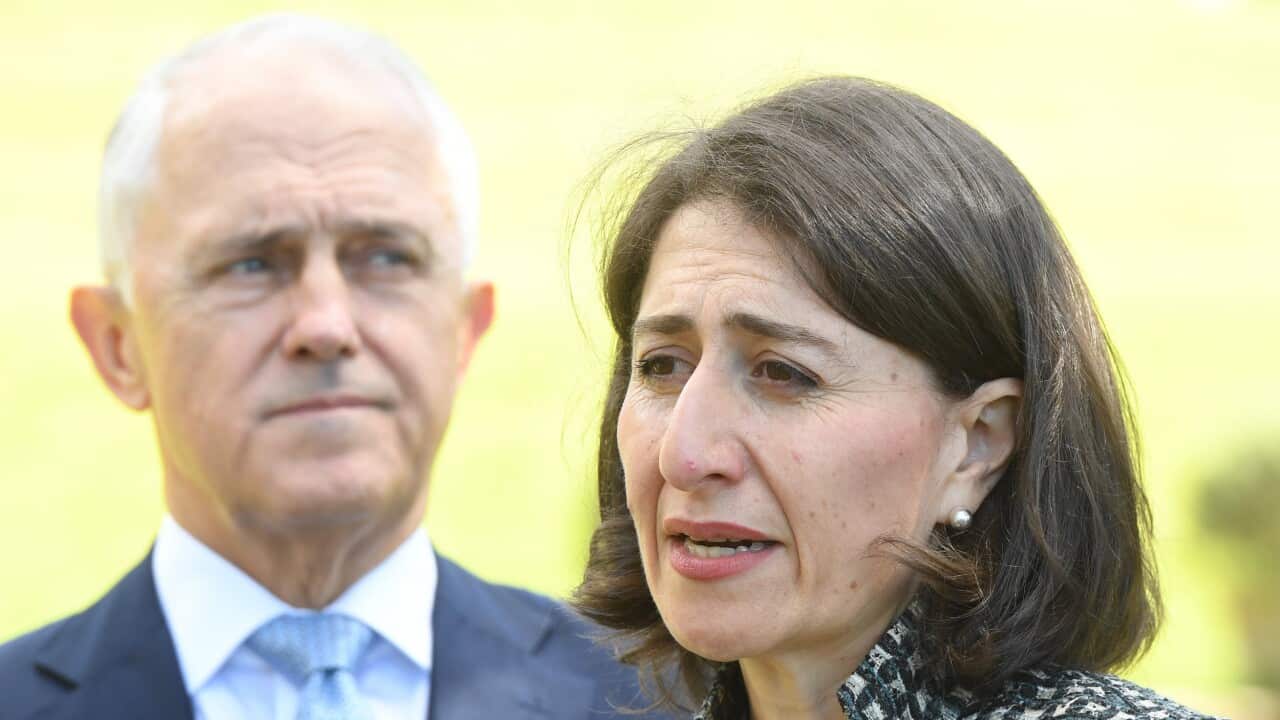 Australian Prime Minister Malcolm Turnbull (left) is joined by New South Wales Premier Gladys Berejiklian (right)