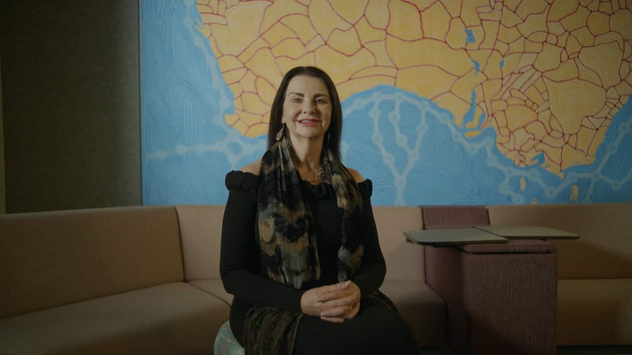 Debbie Barwick, founder of Winya Indigenous Furniture sitting on a chair