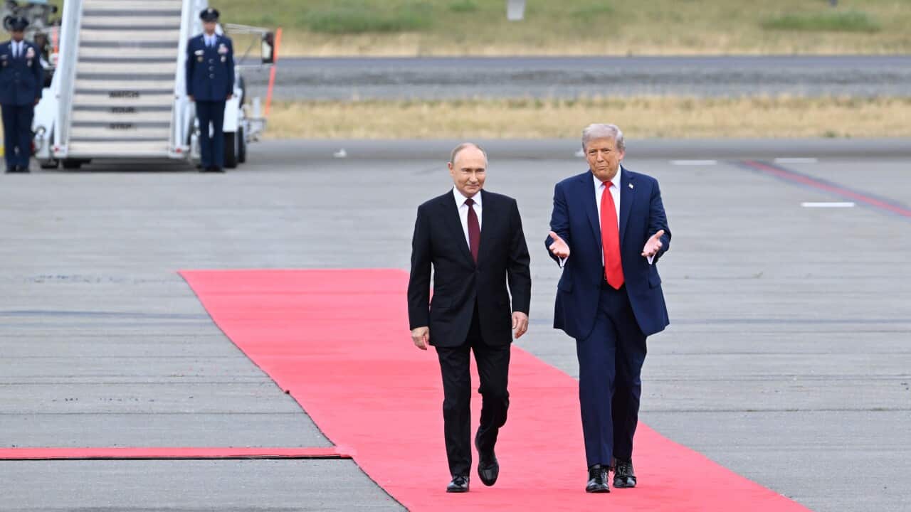 Russian President Vladimir Putin and U.S. President Donald Trump meet at Elmendorf-Richardson Air Force Base.