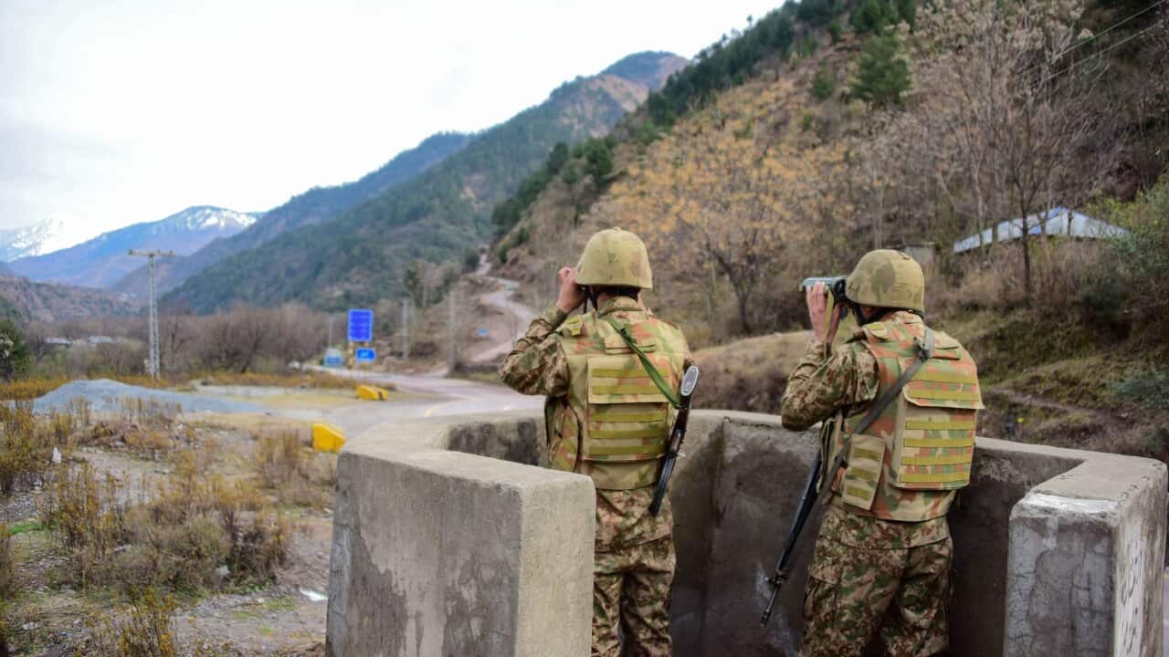 Pakistani soldiers watching over potential Indian troop movements on Saturday at the Chakothi post, near the Pakistan-India border.