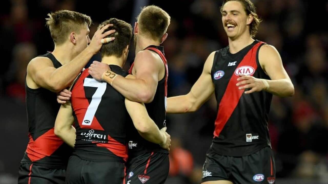 Bombers celebrate a goal from Zach Merrett
