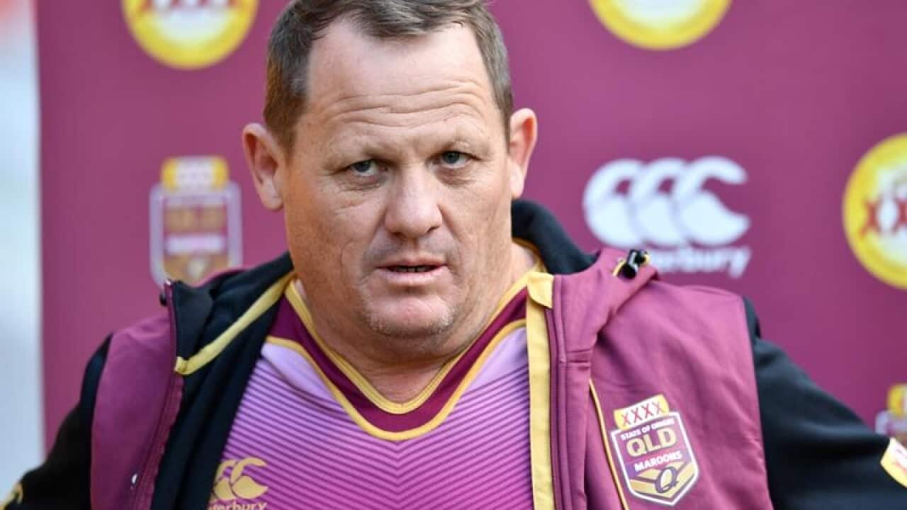 Queensland Coach Kevin Walters faces the media.
