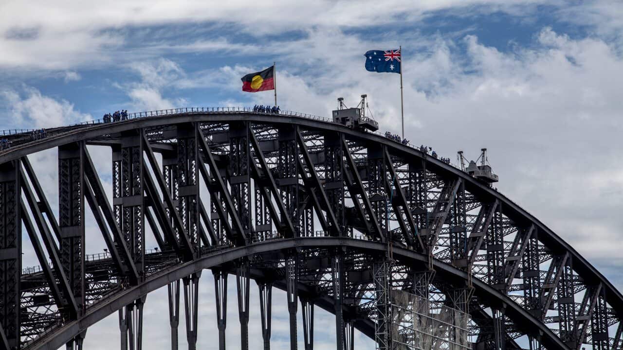 The Australian and the Aboriginal flag together on the Sydney Harbour Bridge