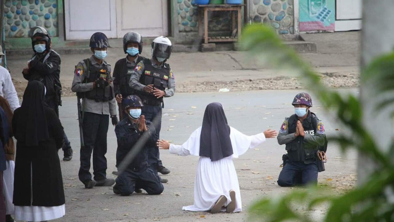 Video showed Sister Ann Rose Nu Tawng kneeling on a street in the town of Myitkyina, speaking to two policemen who were also kneeling.