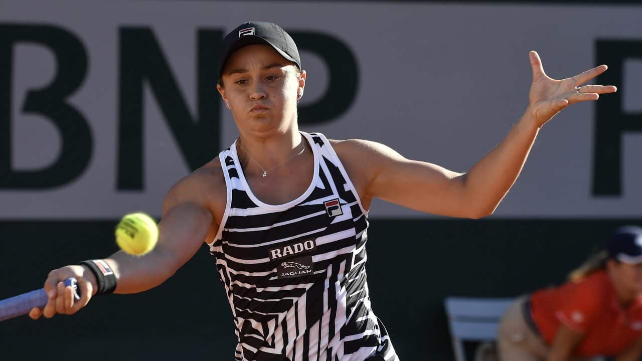 epa07618340 Ashleigh Barty of Australia plays Andrea Petkovic of Germany during their women’s third round match during the French Open tennis tournament at Roland Garros in Paris, France, 01 June 2019. EPA/JULIEN DE ROSA