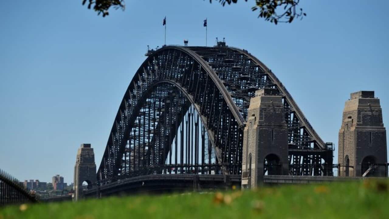 The Sydney Harbour Bridge is seen from Observatory Hill Park, Sydney, Monday, Dec. 29, 2014. Around 1.6 million people are expected to line Sydney Harbour on New Year's Eve to view the fireworks. (AAP Image/Joel Carrett) NO ARCHIVING