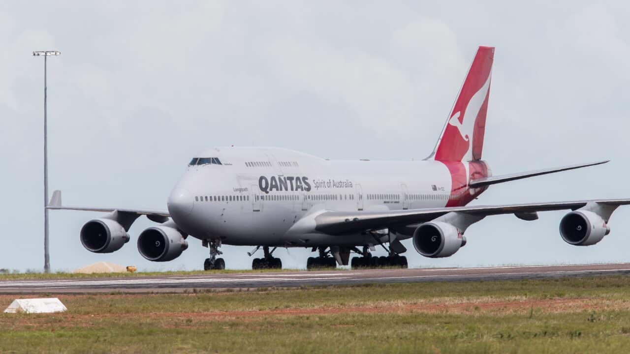 Qantas flight lands