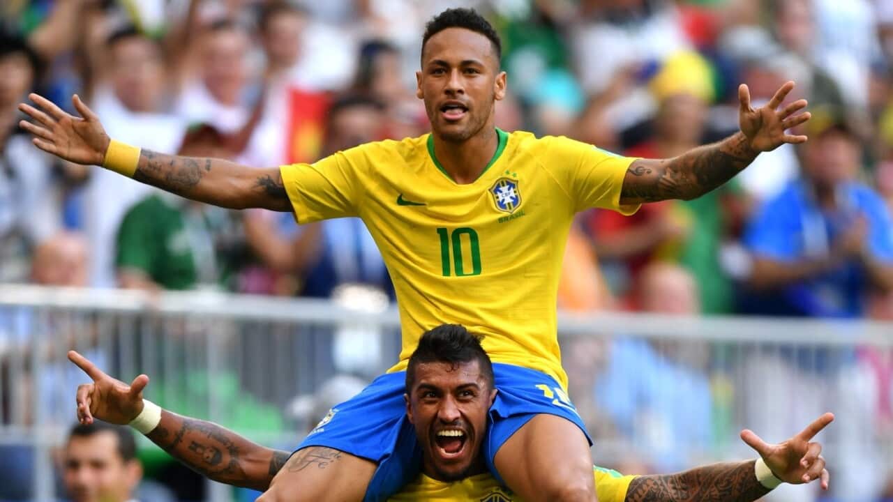 Neymar e Paulinho durante a Copa da Rússia, em 2018: dupla é das mais ativas para arrecadar fundos a necessitados