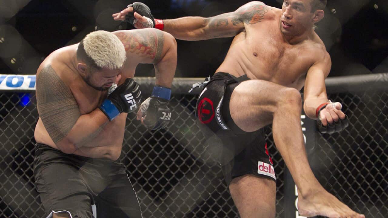 New Zealand's Mark Hunt, left, and Brazil's Fabricio Werdum