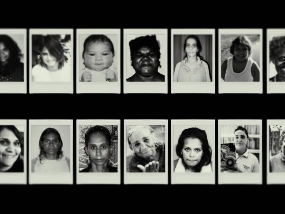 A black and white collage of female faces.