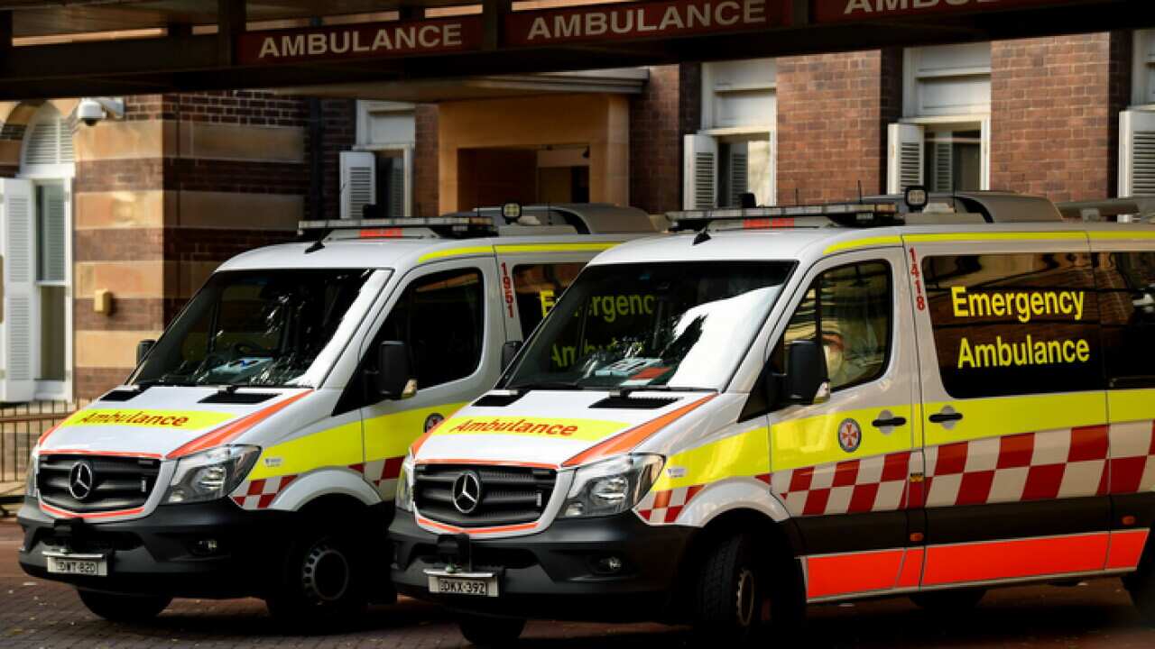 Ambulances are seen outside the Royal Prince Alfred Hospital in Sydney, Thursday, September 6, 2018. (AAP Image/Joel Carrett) NO ARCHIVING